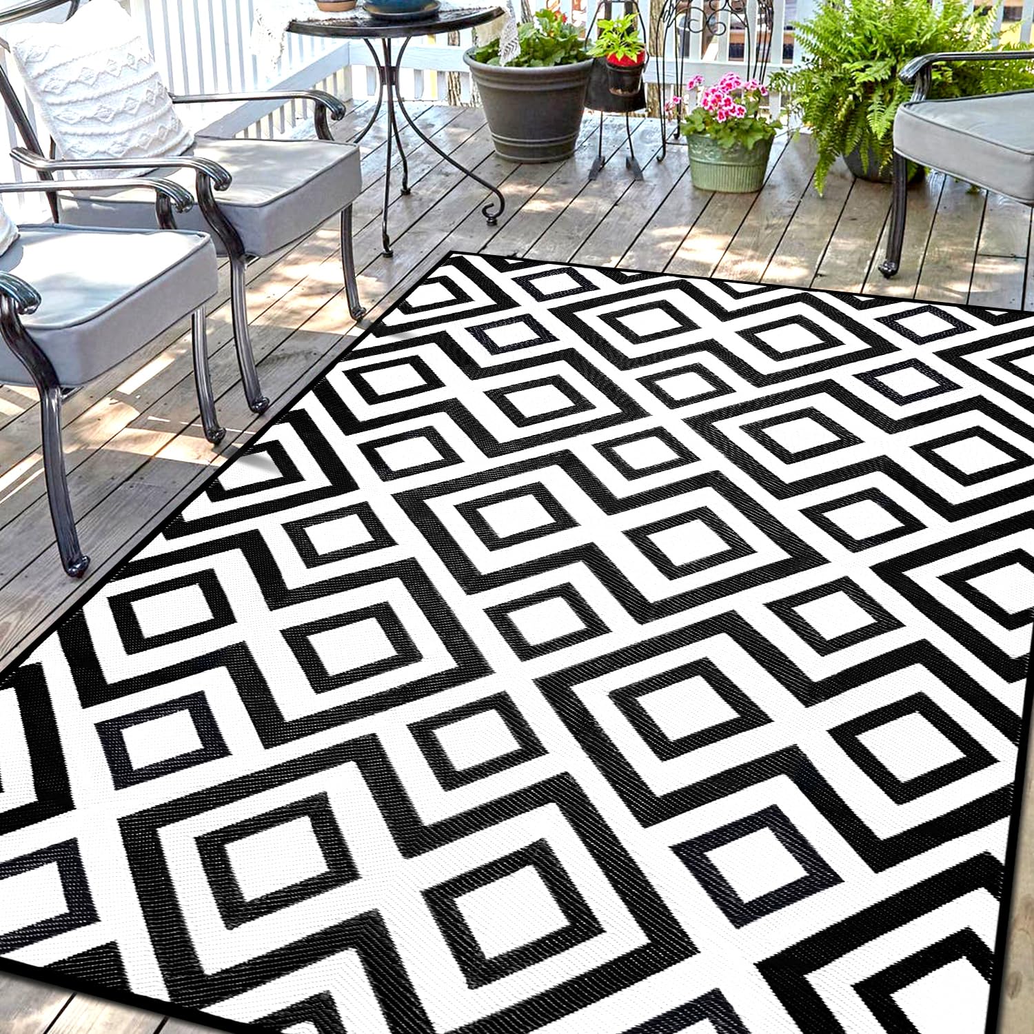 DiiKoo Outdoor Rug Mat for Patio, 6x9ft Waterproof Reversible Plastic Straw Rugs, Camping Carpet Area Mats for RV, Porch, Deck, Backyard, Balcony, Camper, Trailer, Black & White Image