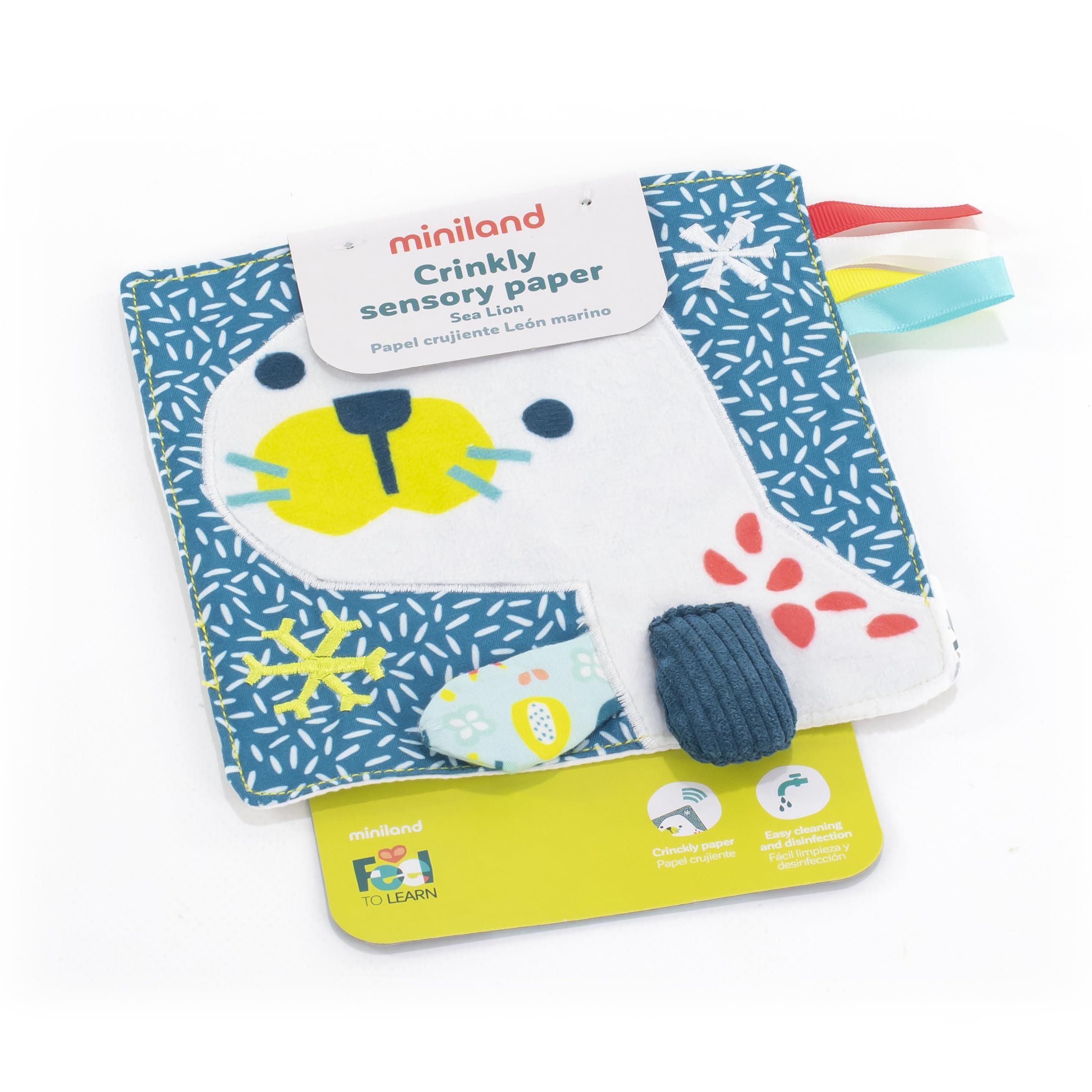Miniland papel crujiente para bebés León Marino. Juego de estimulación sensorial para niños de 0 a 6 meses. Colección Feel to Learn.