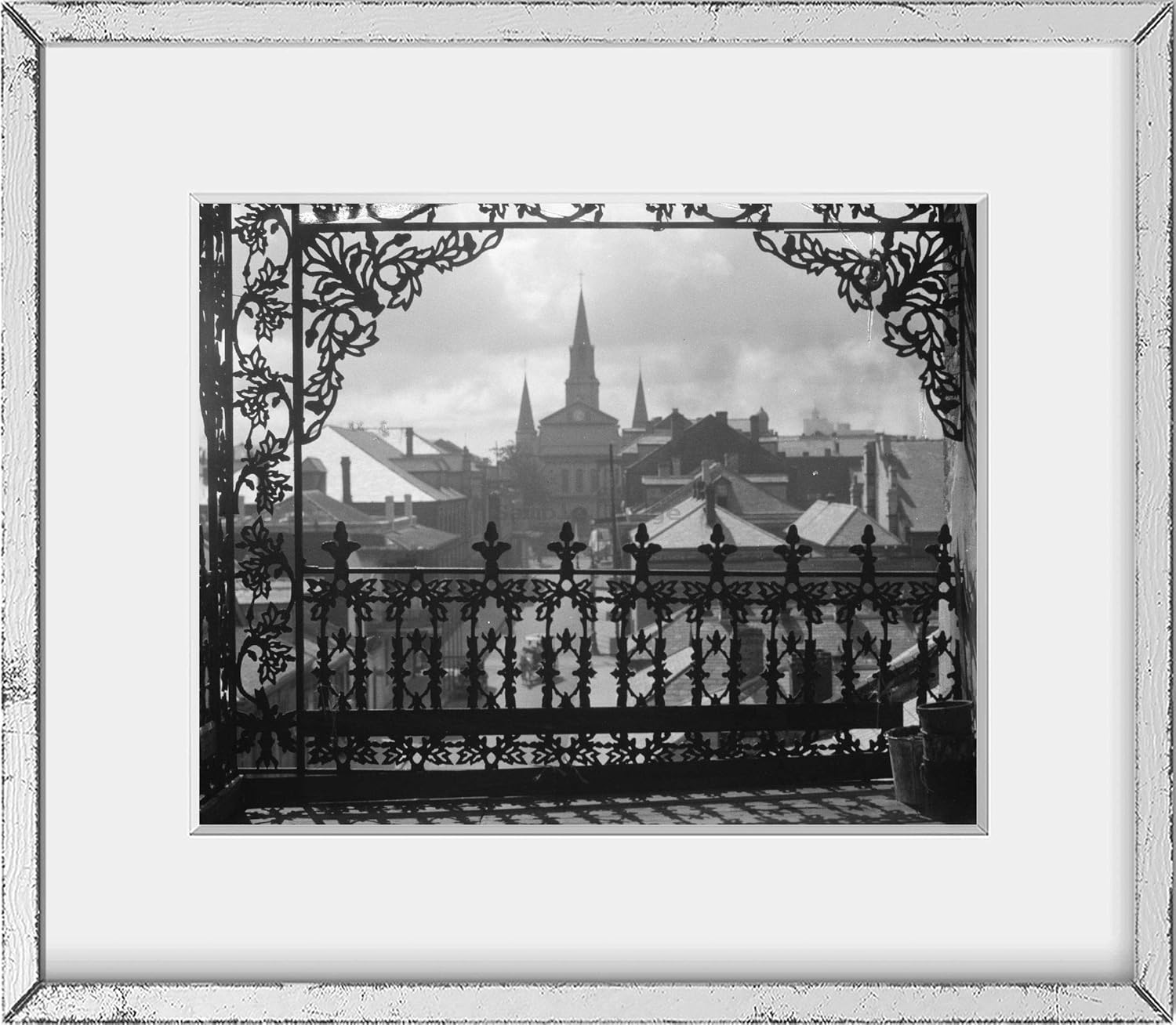Photographs - INFINITE PHOTOGRAPHS 1926 Photograph: A vista through iron lace, New Orleans Subjects: Cities & towns, Balconies, Ironwork.