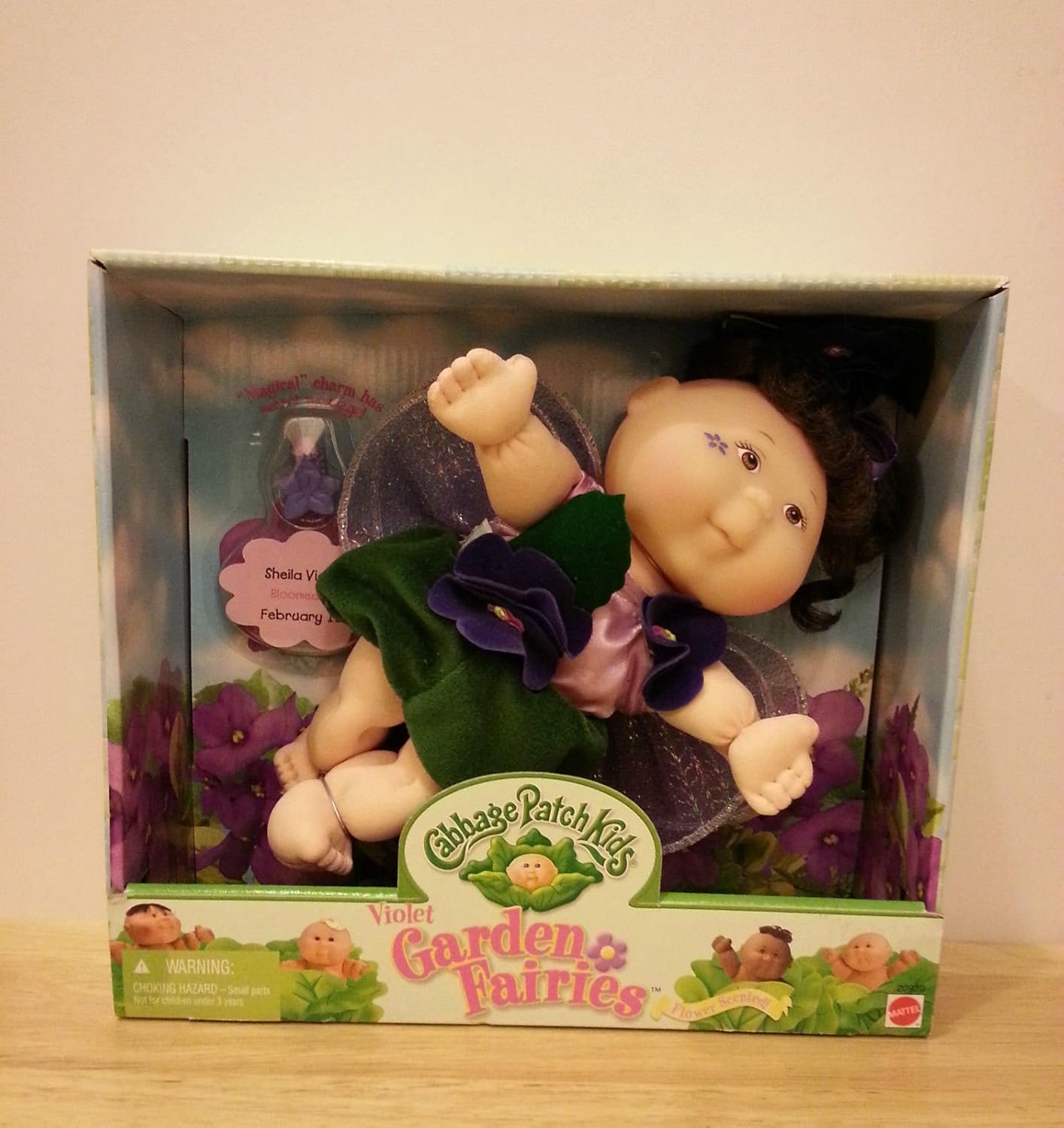 cabbage patch kid with violet eyes