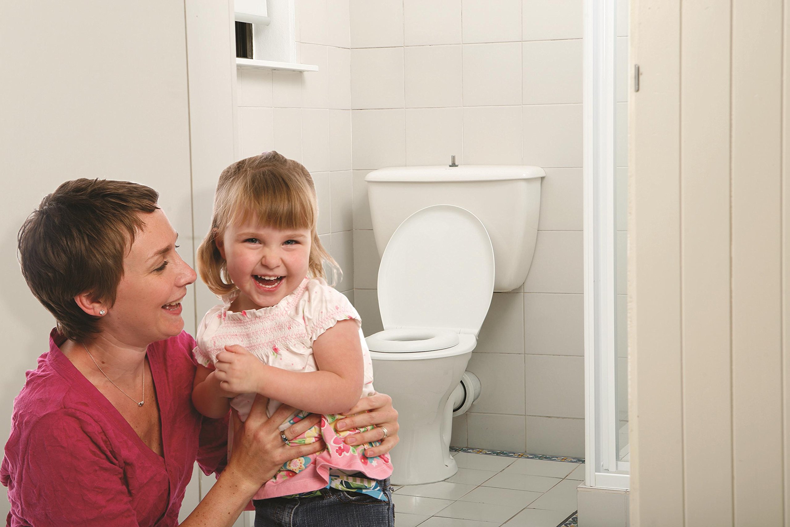 Dreambaby Soft Touch Potty Seat - Comfortable Padded Seat - With High Base Underneath for Secure Positioning - Fit Most Standard Toilets - White - Model L604