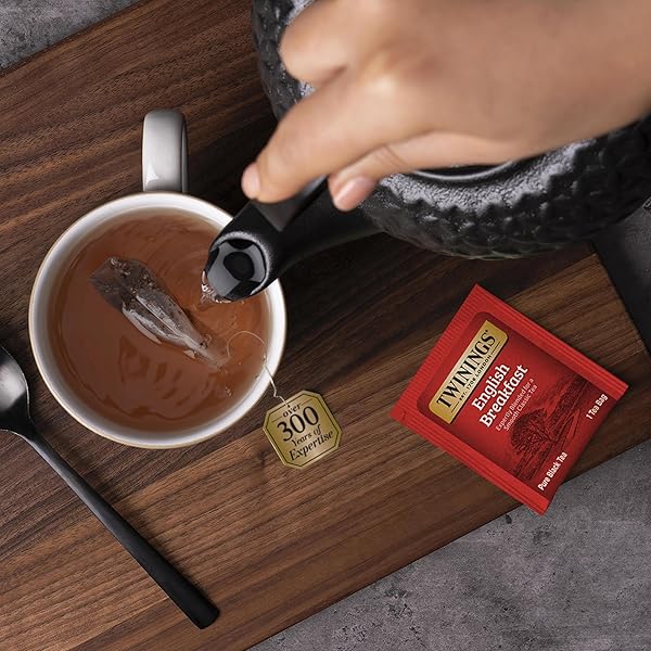 TWININGS ENGLISH BREAKFAST BLACK TEA INDIVIDUALLY WRAPPED BAGS, 100 COUNT (PACK OF 1), SMOOTH, FLAVOURFUL, AND ROBUST, CAFFEINATED, ENJOY HOT OR ICED | PACKAGING MAY VARY