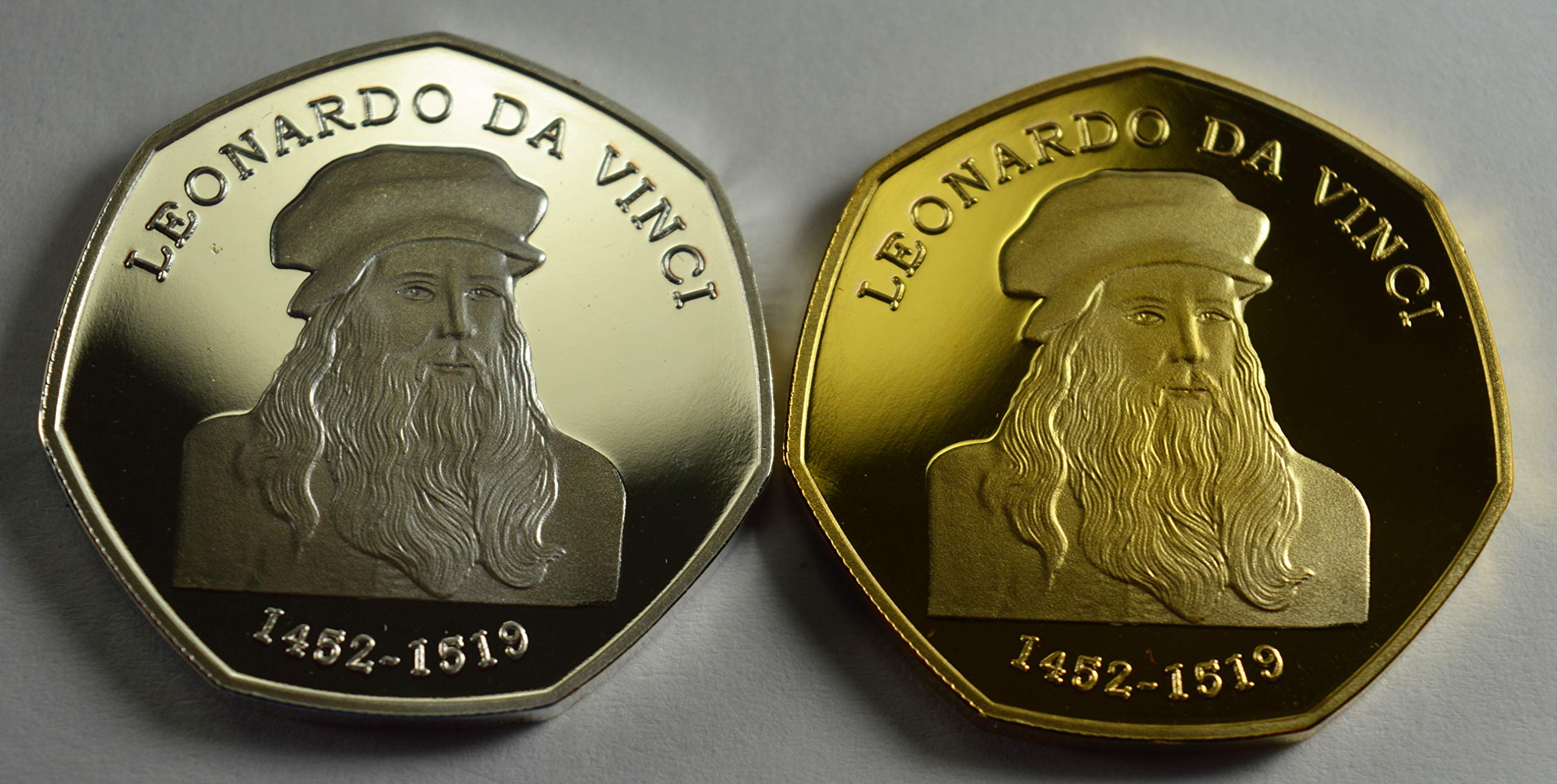Pair of LEONARDO DA VINCI Silver & 24ct Gold Commemorative Coins Albums/50p Collectors. VITRUVIAN NAM