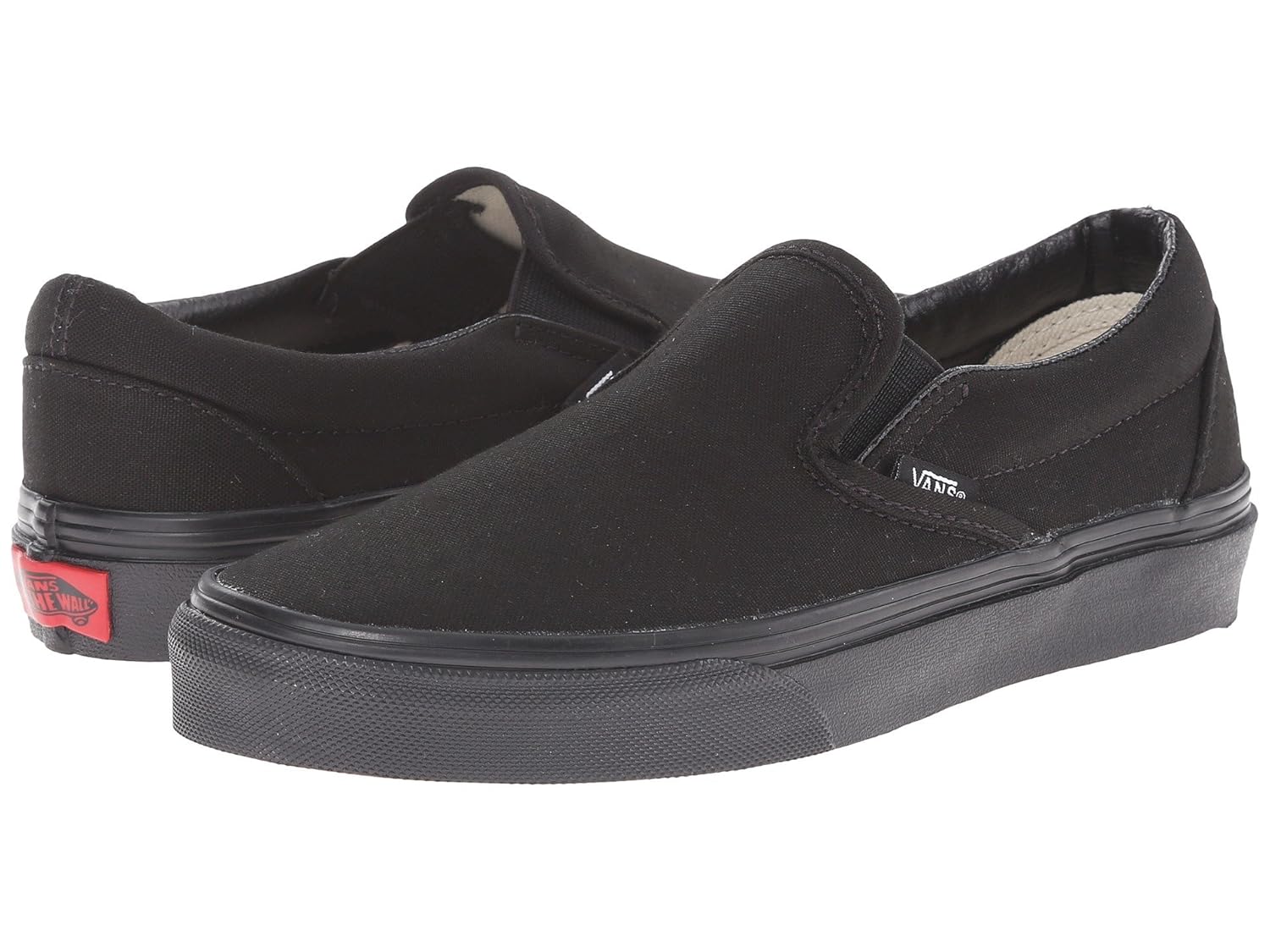 full black slip on vans
