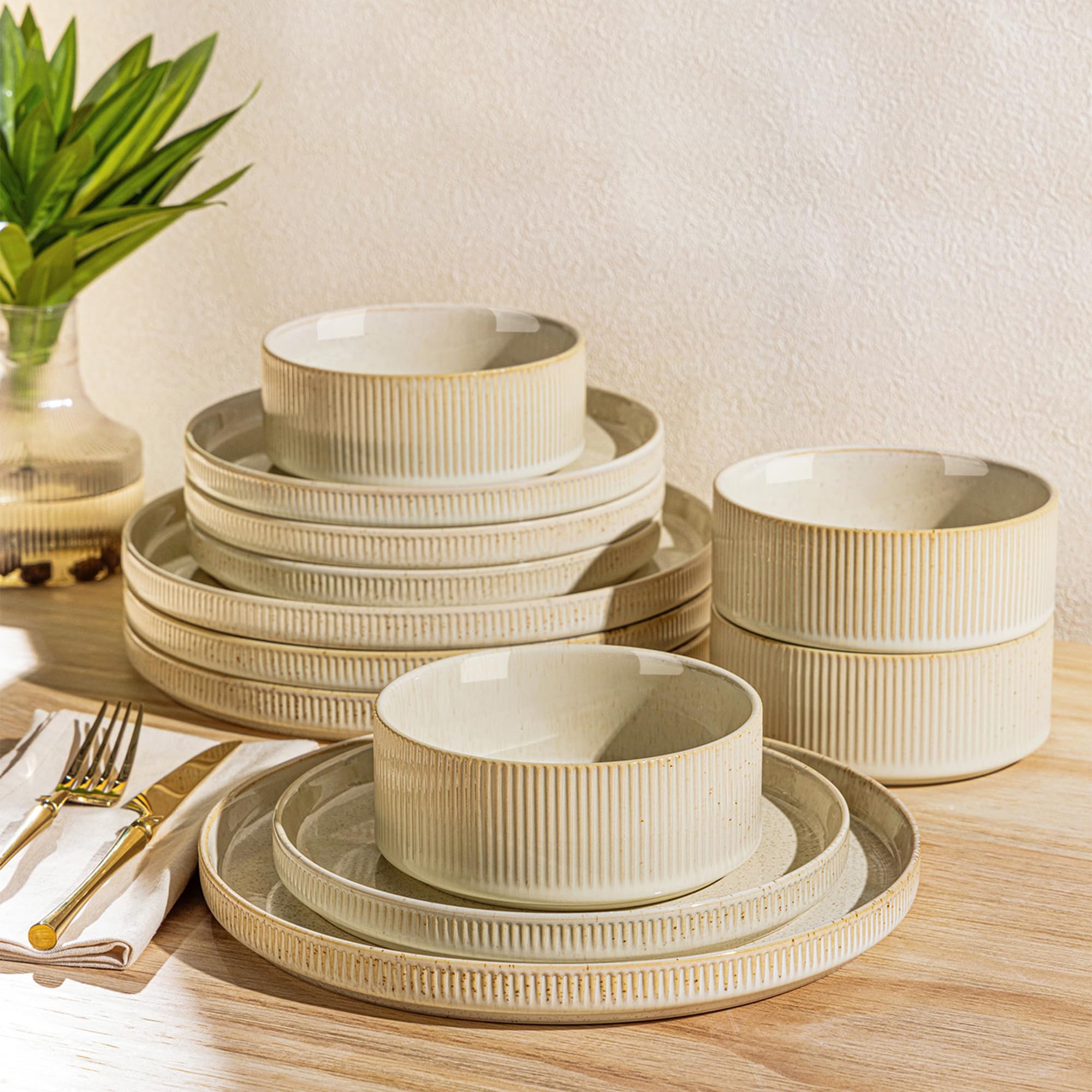 Photo 1 of TheTerra Ceramic Dinnerware Sets for 4, 12 Pieces Porcelain Lightweight Speckled Plates and Bowls Sets, Scratch Resistant Dish Set, Oven & Microwave & Dishwasher Safe