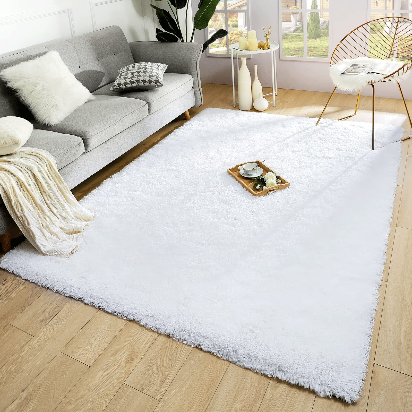 Photo 1 of Merelax Soft Modern Indoor Large Shaggy Rug for Bedroom Livingroom Dorm Kids Room Home Decorative, Non-Slip Plush Fluffy Furry Fur Area Rugs Comfy Nursery Accent Floor Carpet 5x8 Feet, White