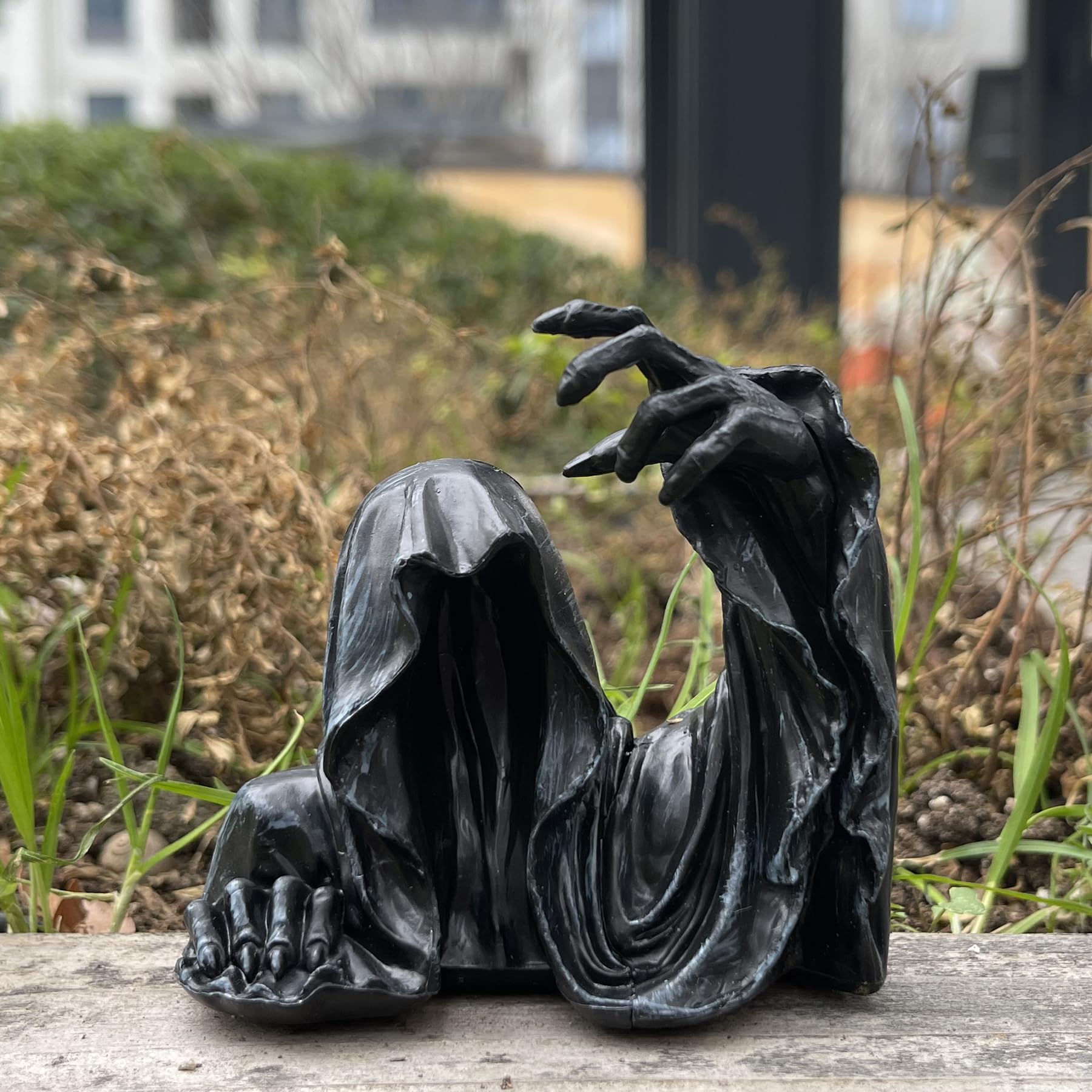 Photo 1 of Peibang Grim Reaper Sitting Statue Gothic Scary Art Decor Black Robe Mystery Man Creepy Outdoor Indoor Statute Novelty Creeper Home Decor Accent for Shelf, Table and Desktop (Half)