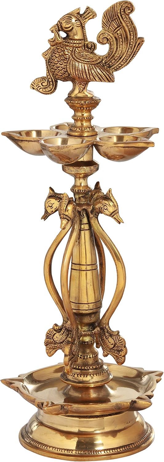 Buy Exotic India Puja Lamp with Peacock ATOP Brass Statue Color Polish Brass Color Online at