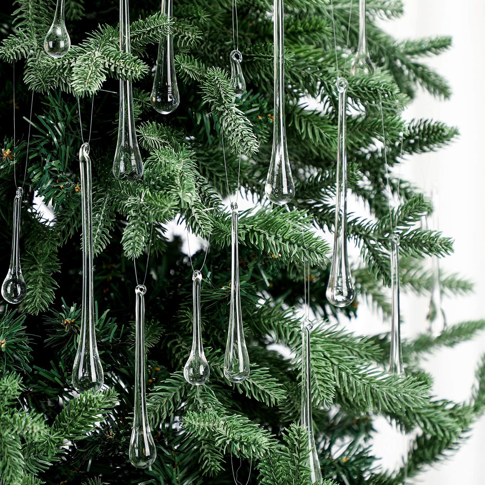 Photo 1 of LOYIM Clear Glass Teardrop Winter Ornaments Crystal Raindrop Hanging Ornaments Crystal Chandelier Drop Pendant Icicles Decorations for Christmas Tree Winter Party Supplies(44 Pcs,4 Medium Size)