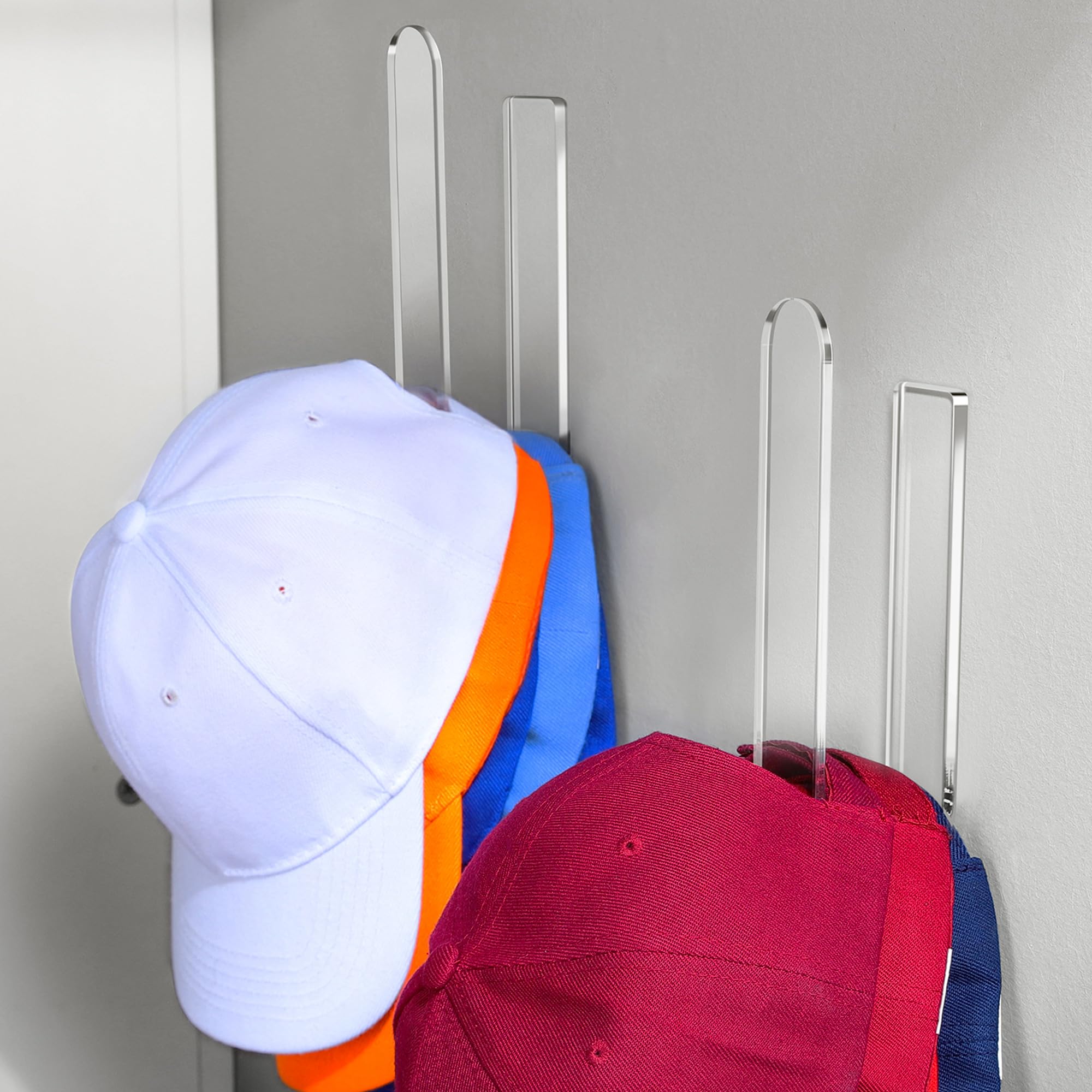 Photo 1 of Daoun 2 Packs Hat Hangers for Wall - Hat Hook Acrylic Baseball Hat Rack Adhesive Baseball Cap Organizer Hat Holder for Wall Closet Door Bedroom Organization