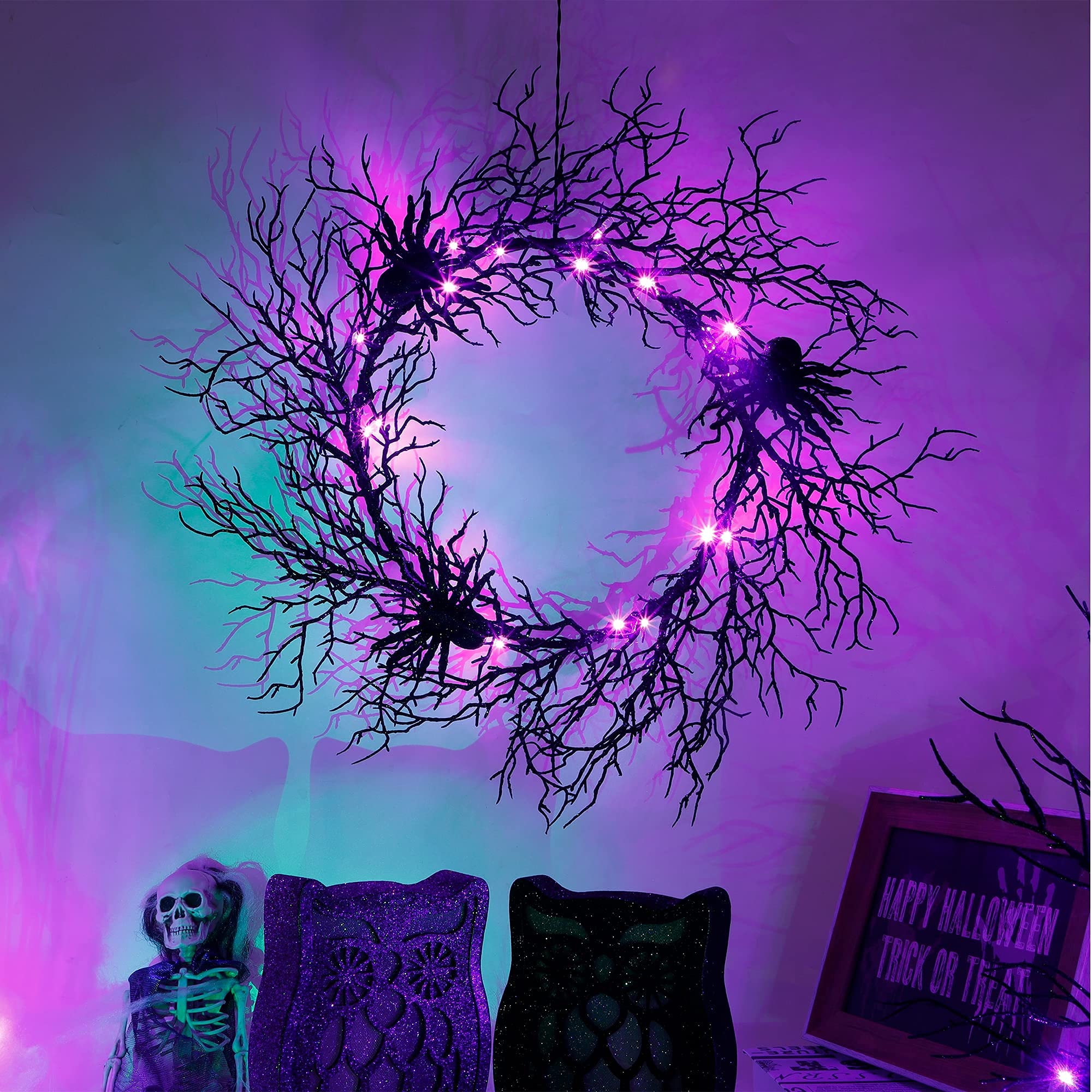 Photo 1 of Adroiteet 24 Inch Halloween Wreath for Front Door - Lighted Black Spider Wreath with Purple LED Lights, Outdoor/Indoor Spooky Decorations for Halloween Party, Porch, Holiday Home Decor