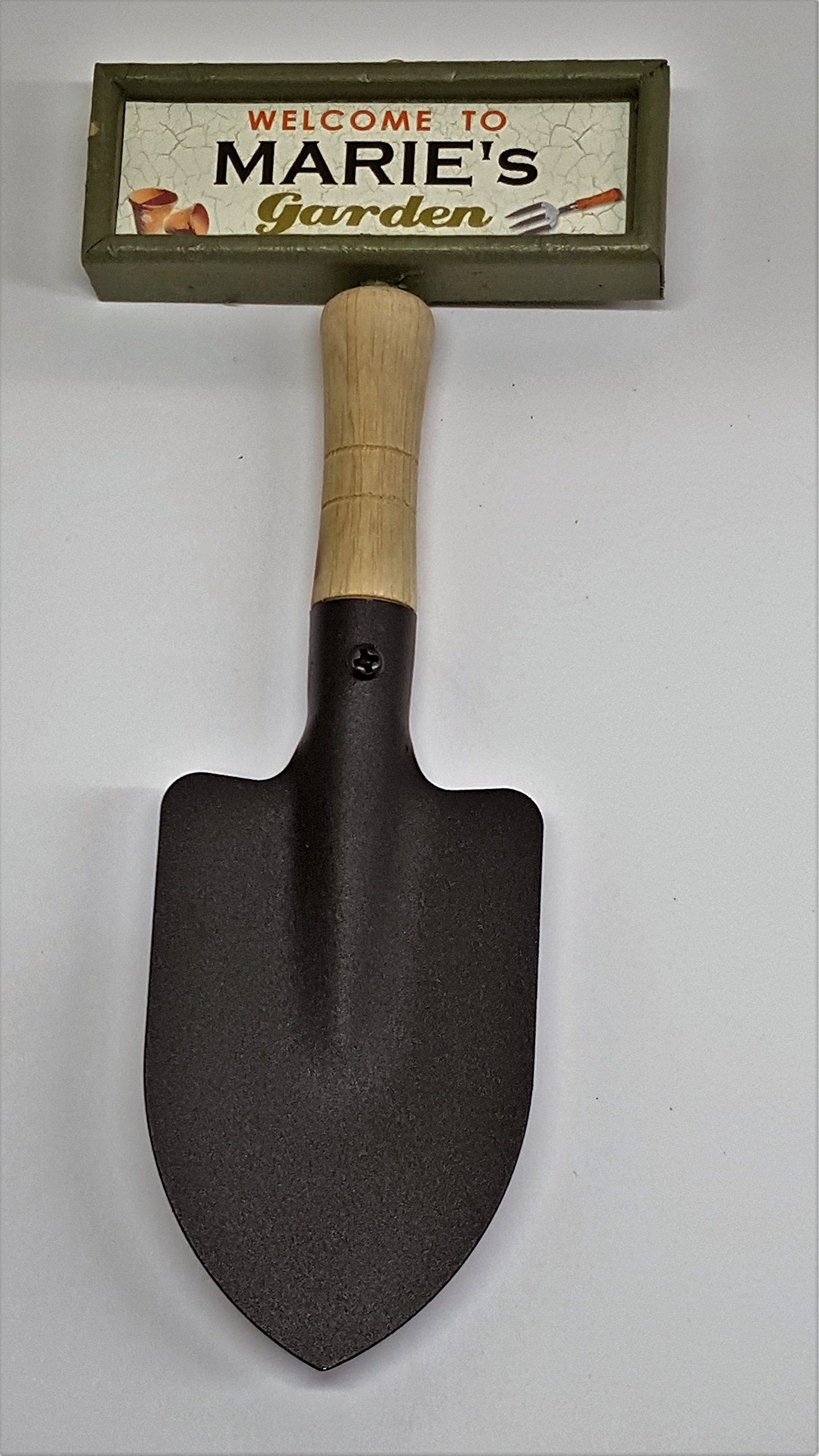 "Welcome to Marie's garden" hanging shovel sign