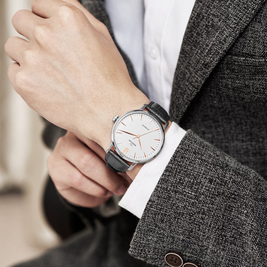 Swiss-Made-Marvin-Automatic-Men-Watches-with-White-Dial-and-Rose-Gold-PVD-Indexes