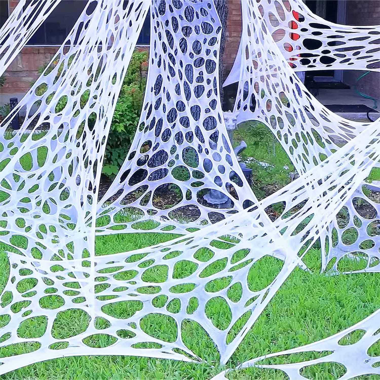 Photo 1 of YHFUISK Giant Durable Spider Webs Halloween Decorations Outdoor, Stretchy Beef Netting for Halloween Party, Decorations Indoor Party, Spider Web Decor for Haunted House (2400 Sqft)