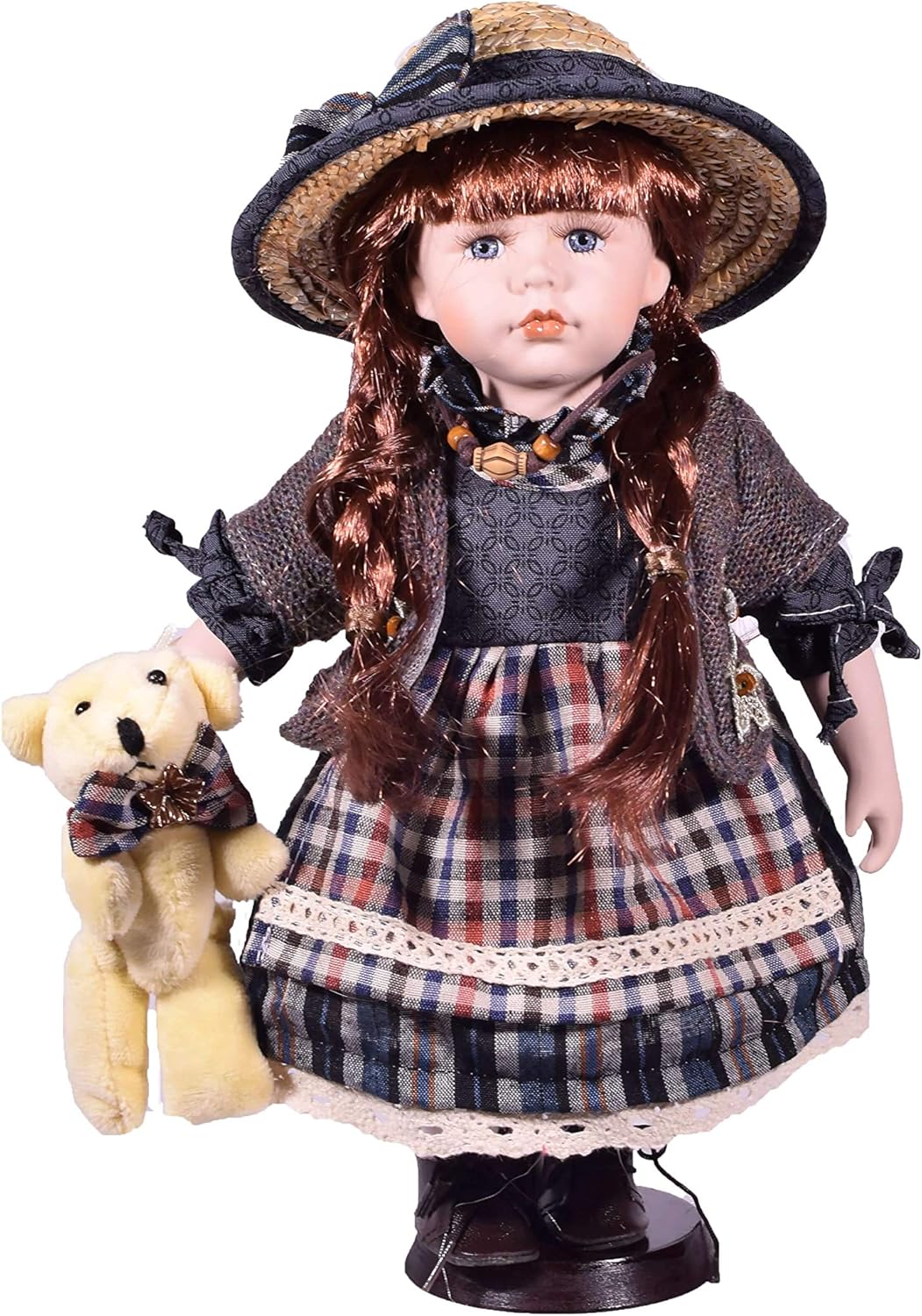 porcelain doll with teddy bear