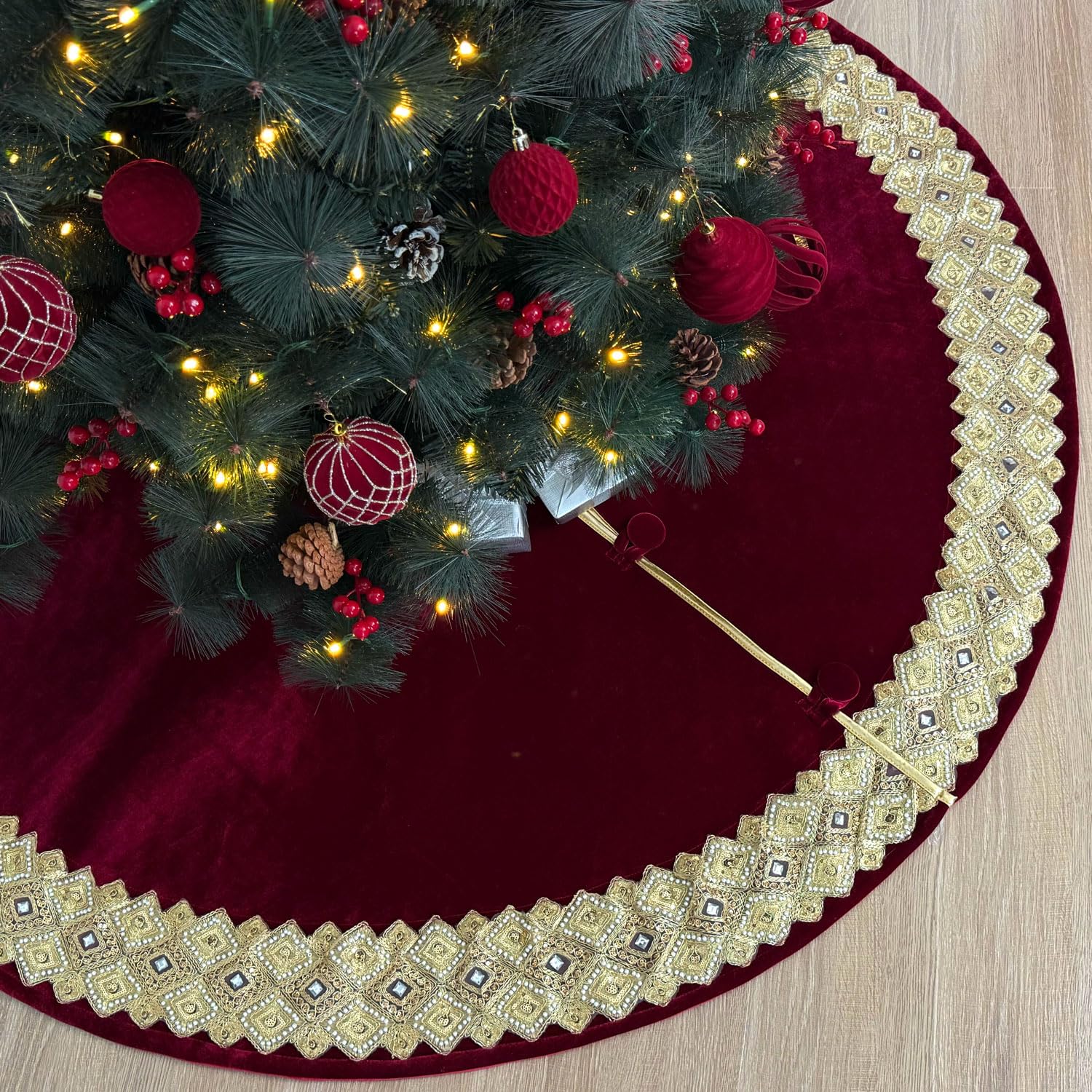 Photo 1 of Starry Dynamo 60-Inch Venetian Gilded Velvet Christmas Tree Skirt with Gold Embellished Border, Foam-Padded, Button Closure, Burgundy