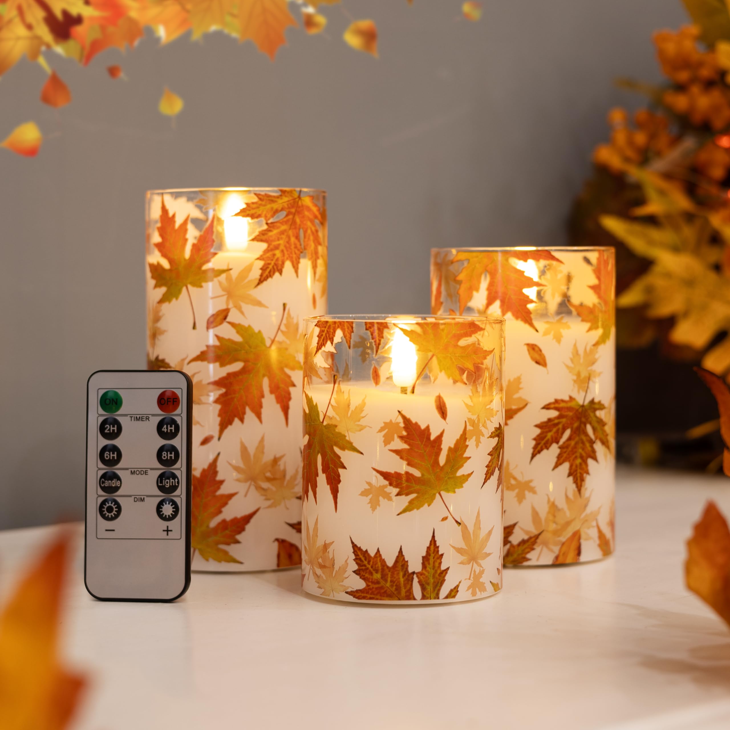 Photo 1 of LUSHARBOR Flameless Candles with Remote, Maple Leaf Battery Operated Glass Candles Flickering LED Candles Fall Thanksgiving Decor Electric Pillar Candles Set of 3