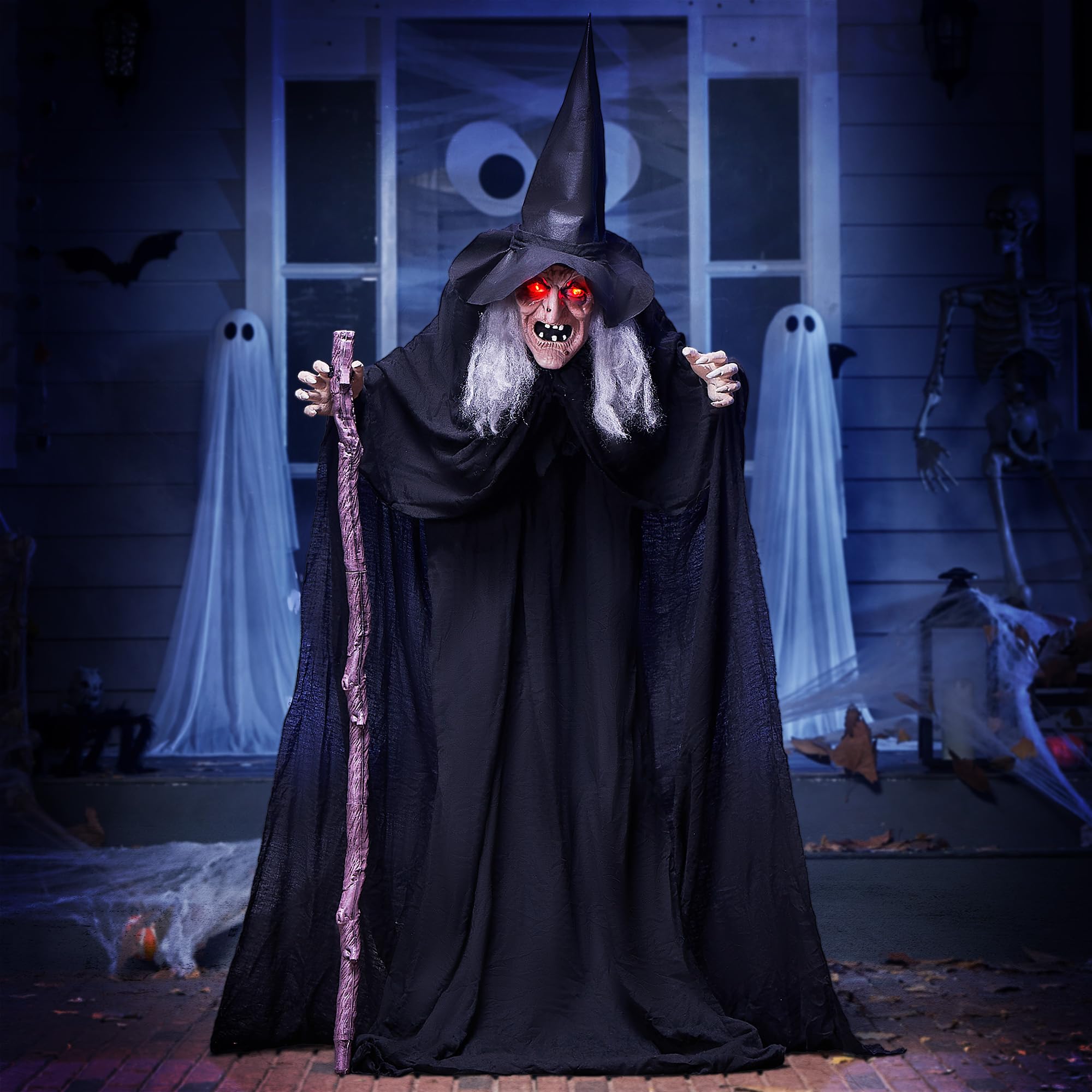 Photo 1 of JOYIN 72" Outdoor Halloween Decorations Animatronics Witch with Cane, Life Size Animated Ghost Haunted House Prop Décor with Creepy Sound and Light-up Eyes, Party Supplies