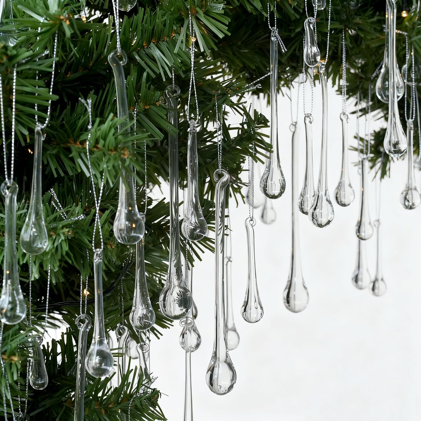 Photo 1 of OuMuaMua 64 Pcs Glass Raindrop Christmas Ornaments Crystal Teardrop Hanging Ornaments Clear Chandelier Drop Pendant Decorations for Christmas Tree Winter New Year Party Supplies Home Decor