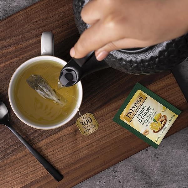 TWININGS LEMON & GINGER HERBAL TEA INDIVIDUALLY WRAPPED BAGS, 100 COUNT (PACK OF 1), TANGY LEMON, SPICY GINGER, NATURALLY CAFFEINE-FREE, ENJOY HOT OR ICED, 100 TEABAGS
