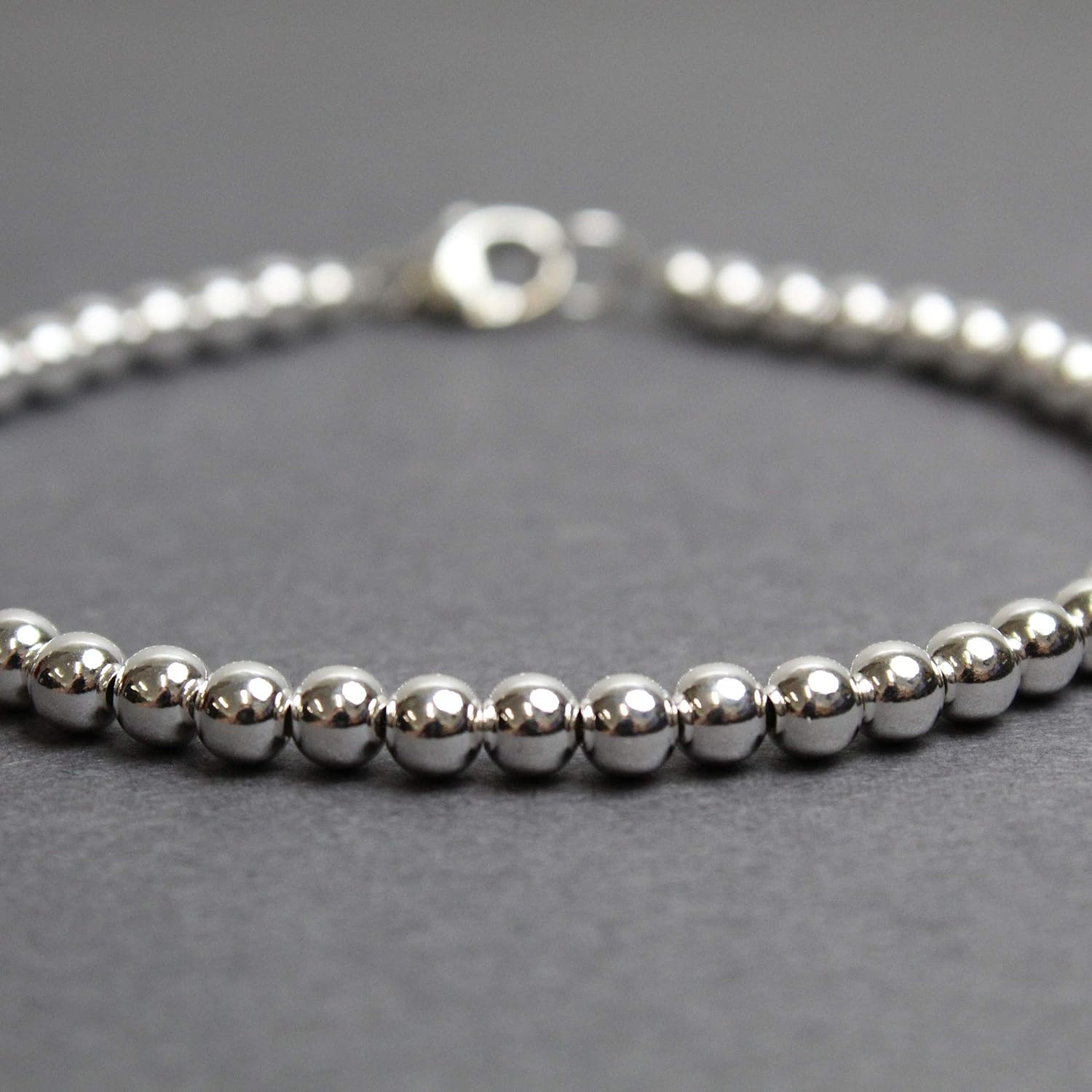 silver bracelet with black beads for women