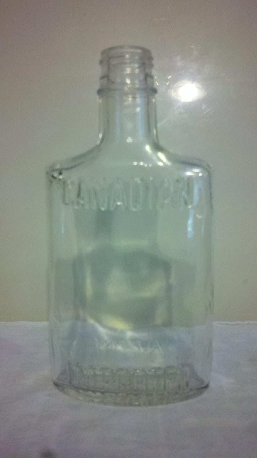 Vintage 1973 Embossed Canadian Imported Half Pint Liquor