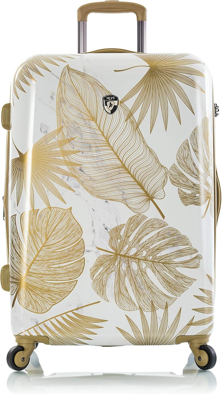 white and gold suitcase