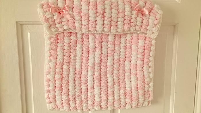 pom pom knitted baby blanket