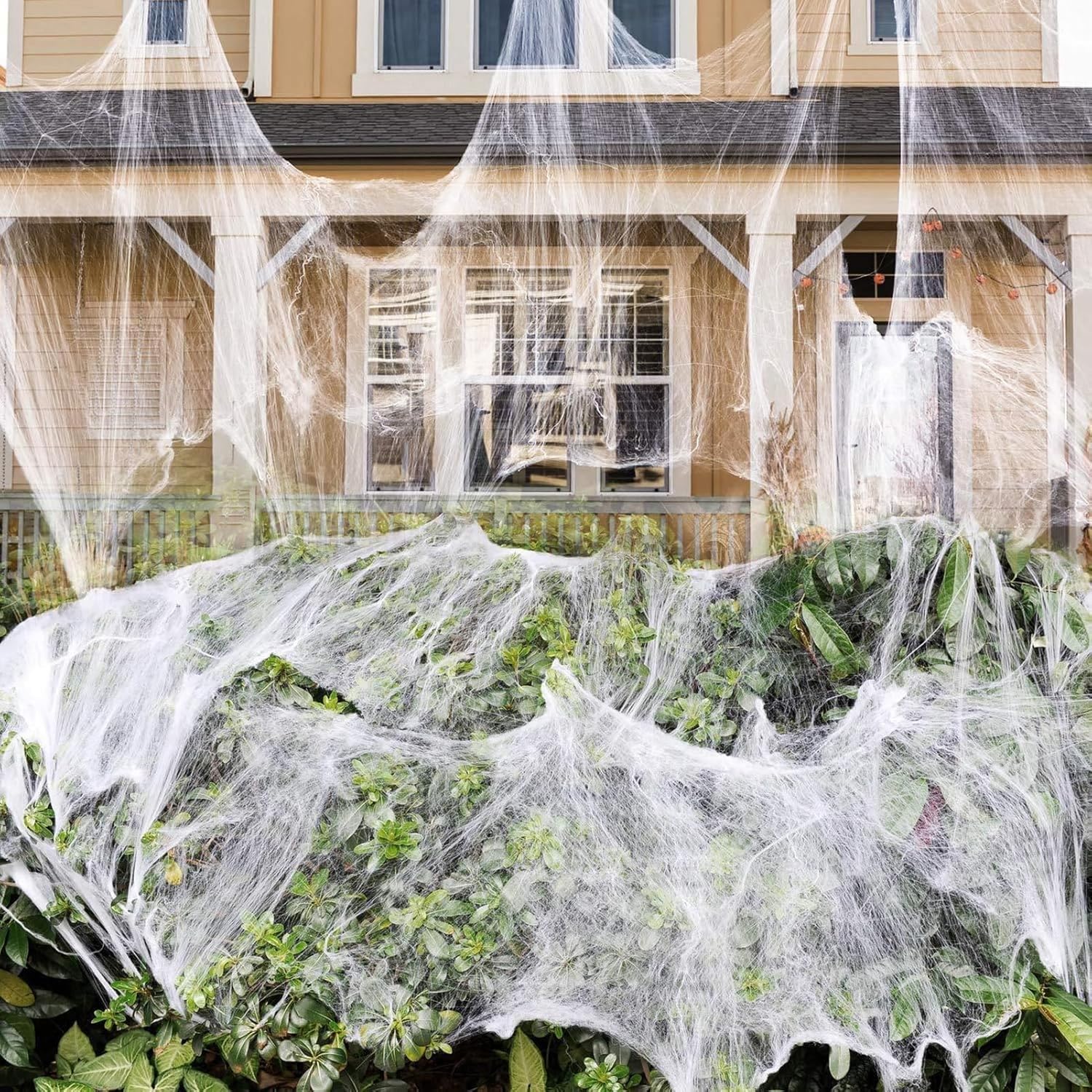 Photo 1 of 1000 sqft Spider Webs Halloween Decorations, Super Stretch Cobwebs for Halloween Indoor and Outdoor Party Supplies