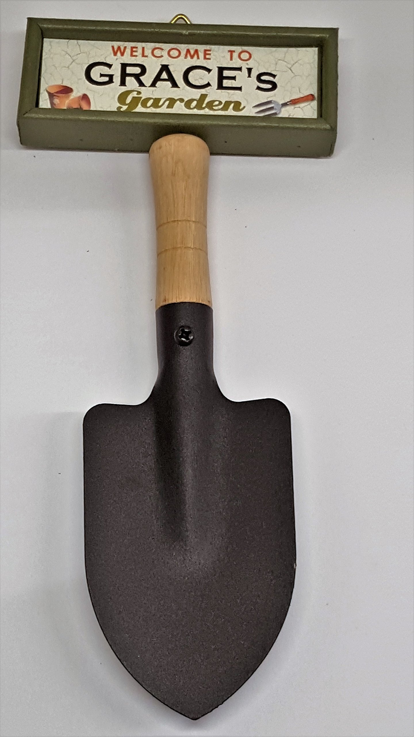 "Welcome to Grace's garden" hanging shovel sign