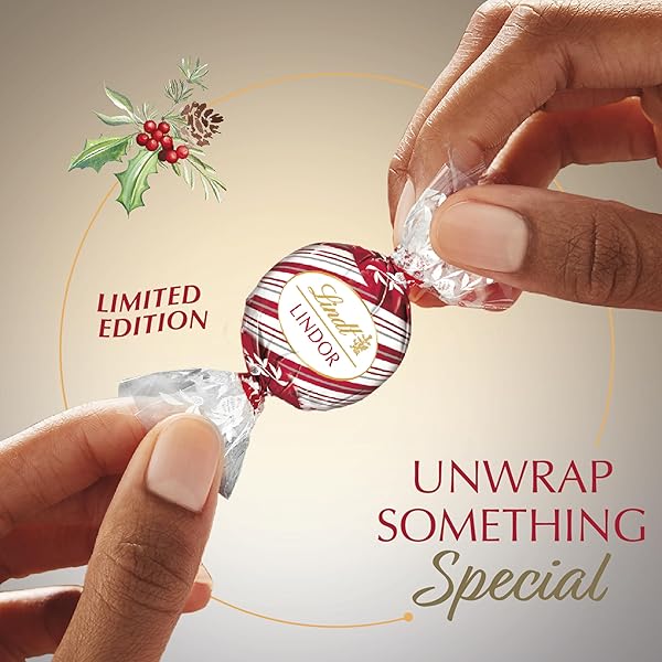LINDT LINDOR WHITE CHOCOLATE PEPPERMINT CANDY TRUFFLES WITH SMOOTH PEPPERMINT TRUFFLE CENTER, 19 OZ. BAG