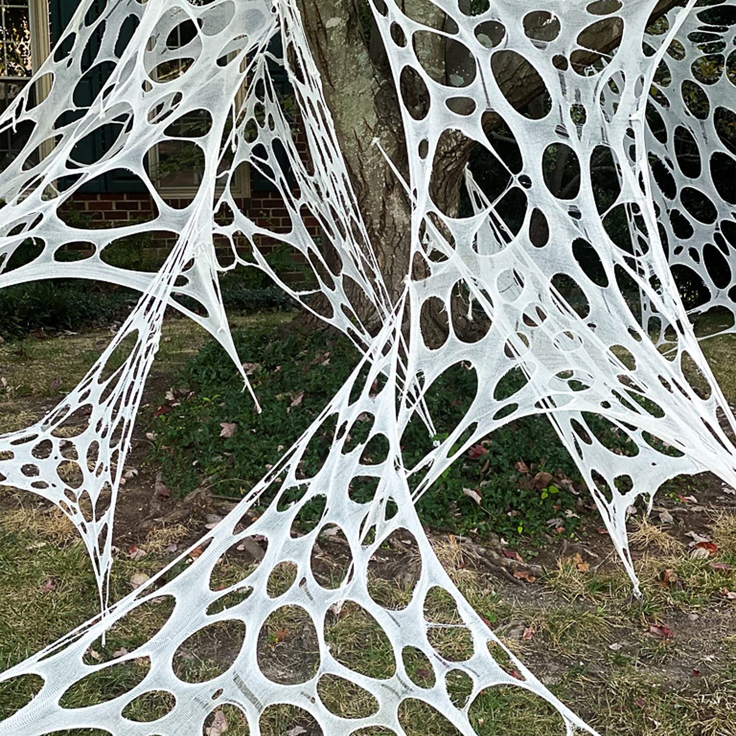 Photo 1 of DAZONGE 2 Packs Spider Webs Halloween Decorations Outdoor, 900sqft Stretchy Spider Webbing for Halloween Decor, Spooky Spider Web Decorations for Hunted House Halloween Party