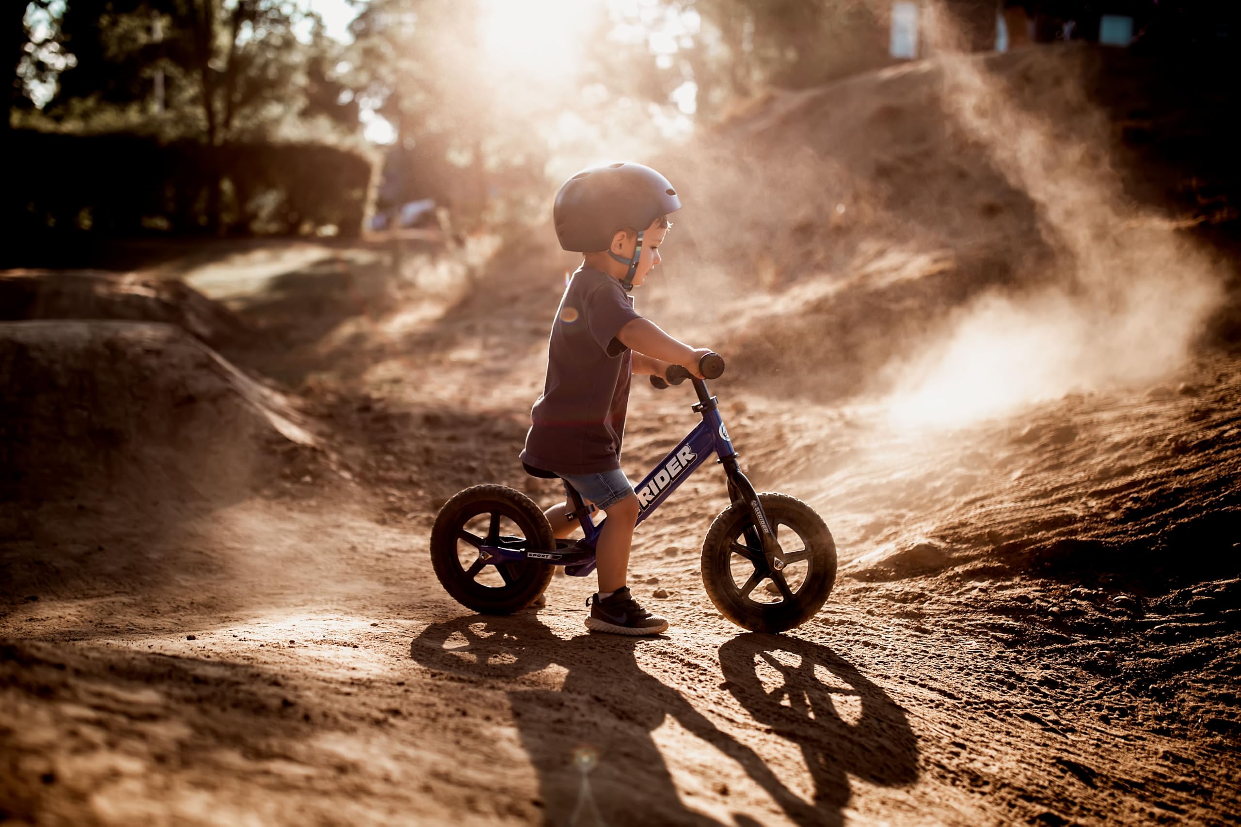 Strider 12” Sport Bike - No Pedal Balance Bicycle for Kids 1 to 4 Years - Includes Safety Pad, Padded Seat, Mini Grips & Flat-Free Tires - Tool-Free Assembly & Adjustments