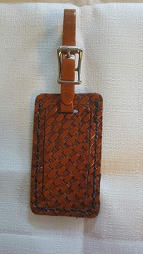 tooled leather luggage