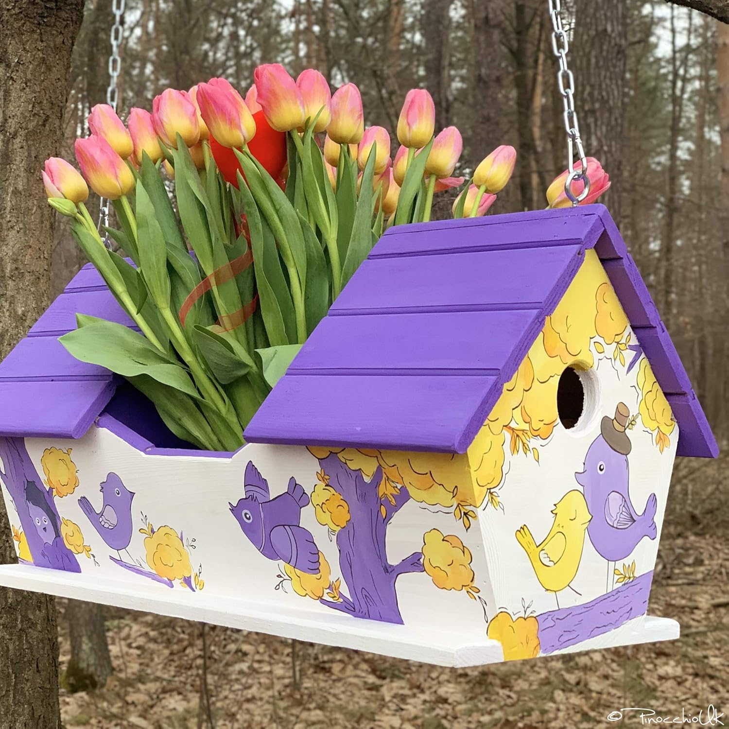 Art outdoor flower pot with birdhouses. Bird shelter