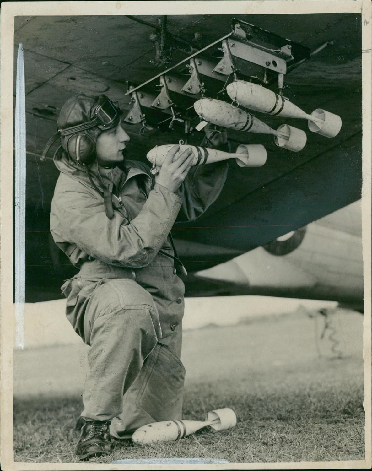 Photographs - Vintage photo of Bombing up by British soldier before training flight