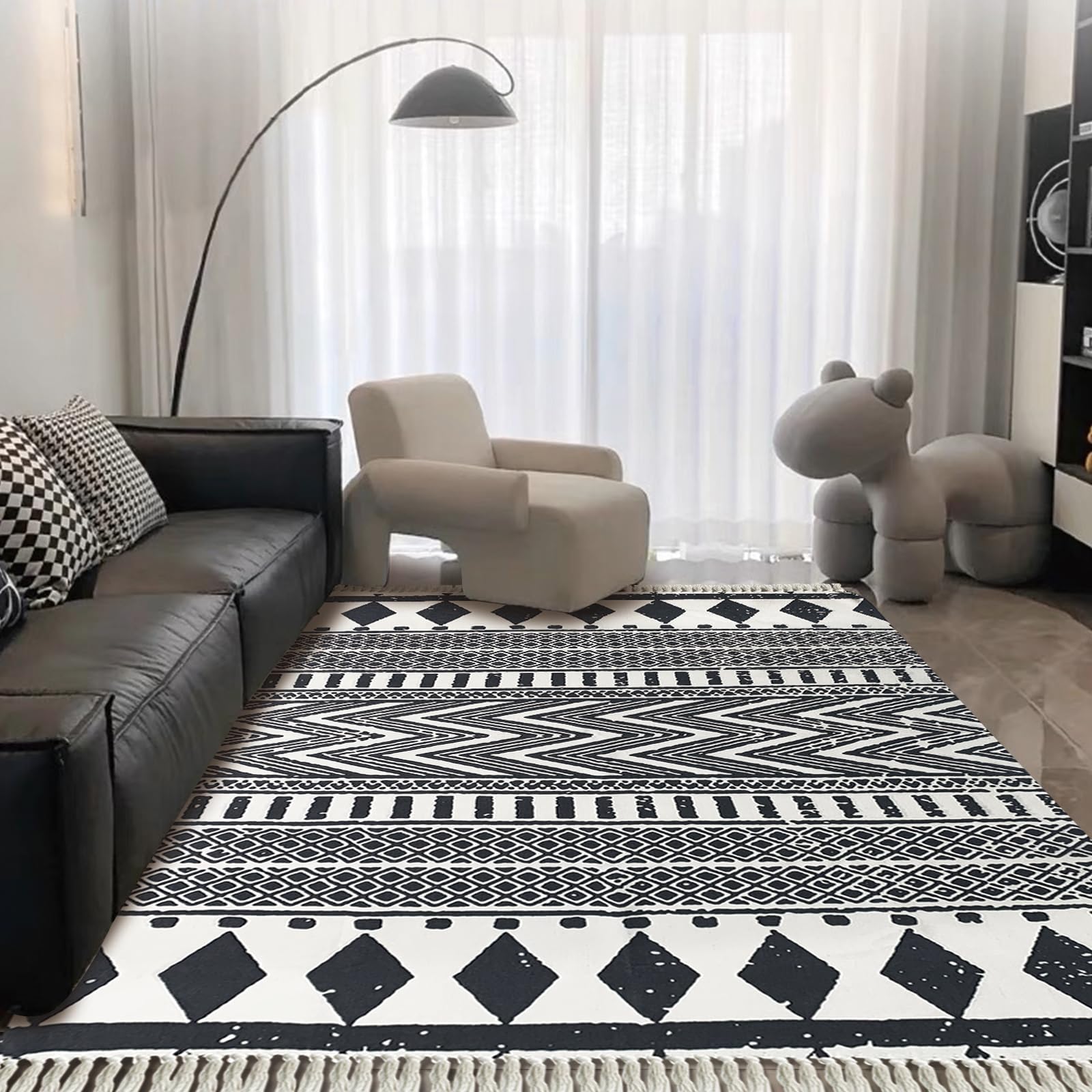 Photo 1 of **DIRT**USTIDE Ultra Large Boho Area Rug Large Hand Woven Black and White Cotton Rugs with Tassels Printed Geometric Tribal Rug for Living Room, Bedroom, Laundry Room, Entryway ?63x90Inches?