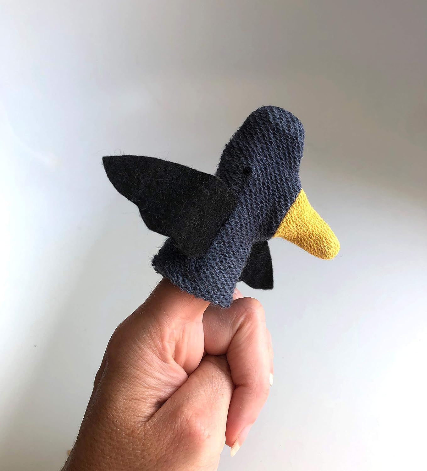 crow finger puppet