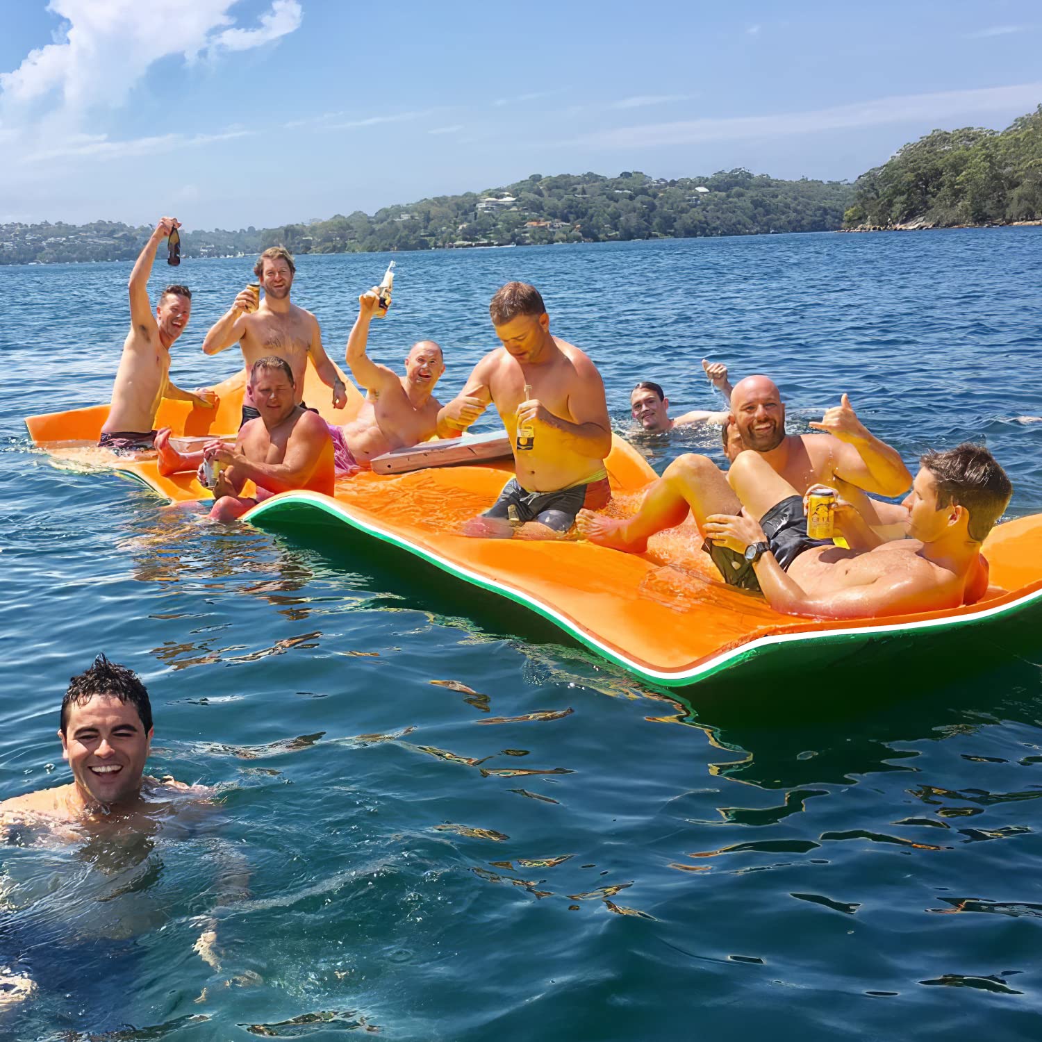 Photo 1 of Big Floating Water Mat 7'/9'/12'/18' Lily Pad Floating Mat for Lakes, Oceans, Beach, 3 Layers XPE Foam Floating Pad Pool Floats for Water Recreation and Relaxing (Green-White-Orange, 12FT)