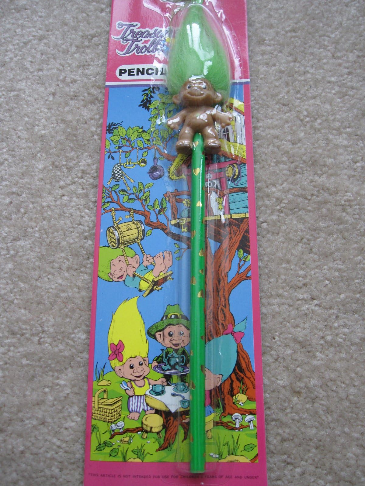 Treasure Troll Pencil with Light Green Hair.... black leaded pencil with green color on outside of pencil