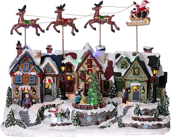 Immagini In Movimento Di Natale.Holyart Villaggio Di Natale Renne Movimento 30x35x20 Luci Musica Corrente Amazon It Casa E Cucina