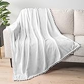 PAVILIA Fleece Throw Blanket for Couch with Pom Pom Fringe, White, Soft Cozy Fuzzy Flannel Blanket for Sofa Bed, Lightweight Plush All Season Throw, 50x60 Inches