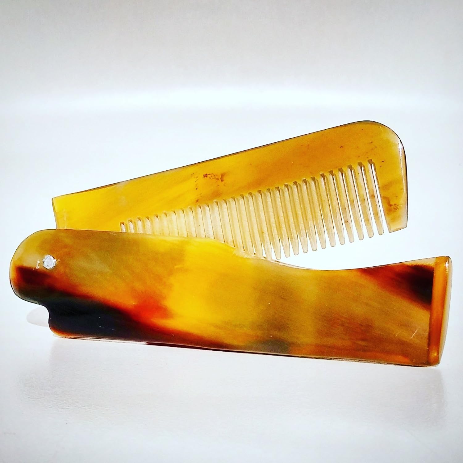 Hand Carved, Ox Horn Folding Moustache & Beard Comb by Revered Beard. Anti Static, Switchblade