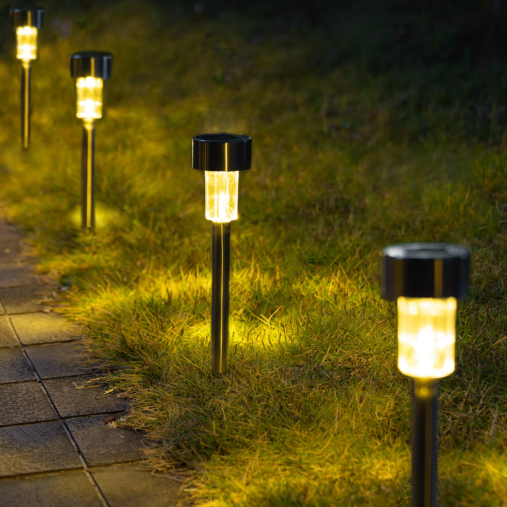Photo 1 of GIGALUMI Solar Pathway Lights 12 Pack, Stainless Steel IP44 Waterproof Auto On/Off Outdoor LED Solar Landscape Lights for Garden, Yard, Patio, Path and Walkway. (Warm White)
