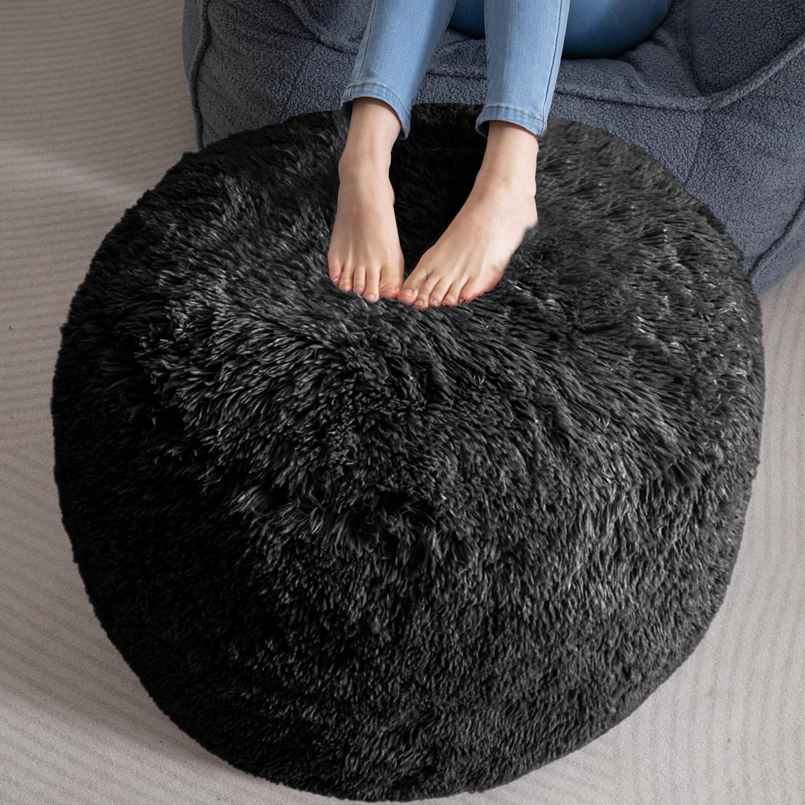 Photo 1 of HIGOGOGO Round Stuffed Pouf Ottoman, Long Faux Fur Poufs with Foam Chunk Filling, Fluffy and Furry Pouf Foot Stool Storage Ottoman, 26 X 18 Floor Poufs Foot Rest for Living Room, Black