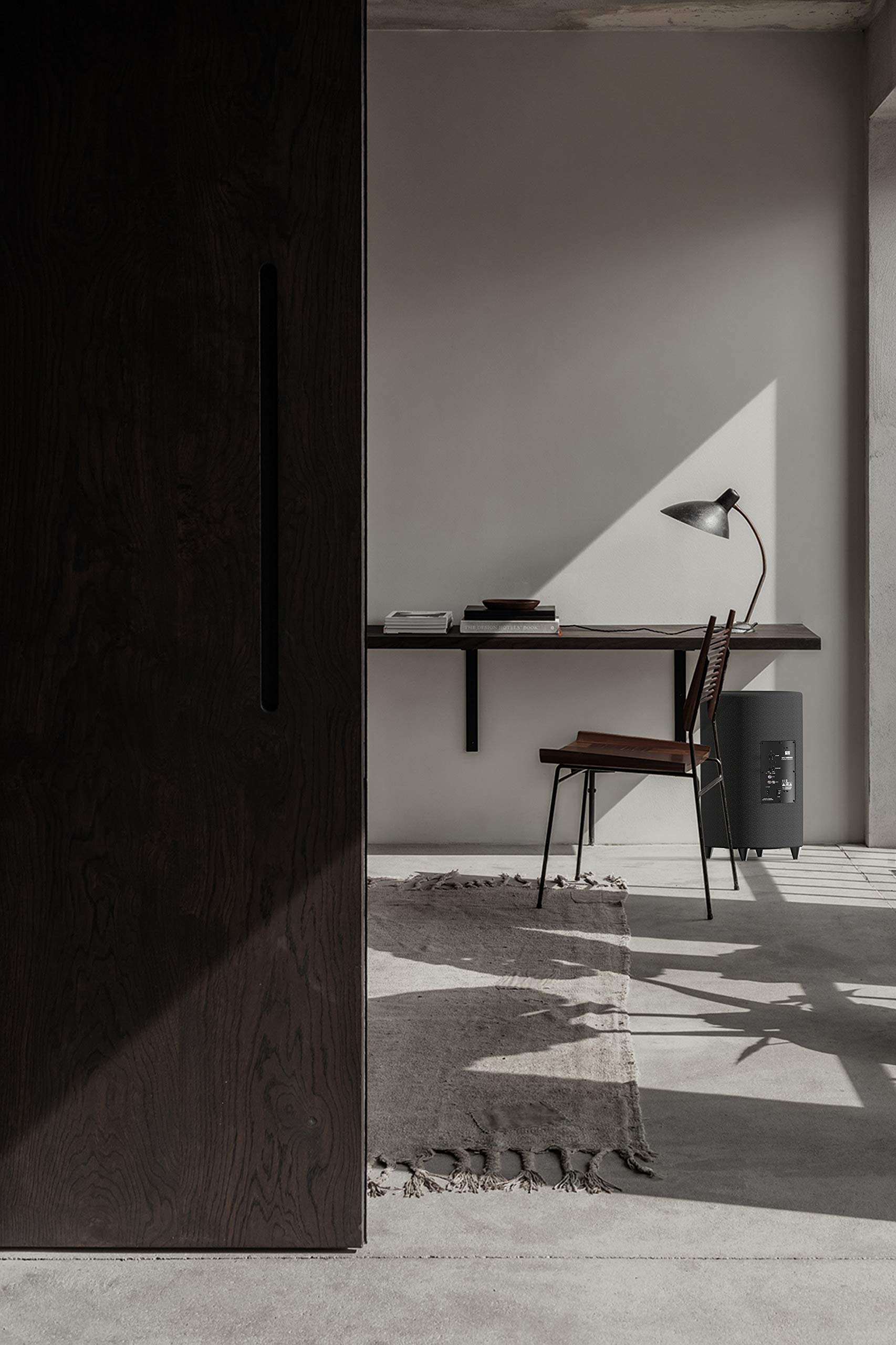 down firing subwoofer on concrete floor