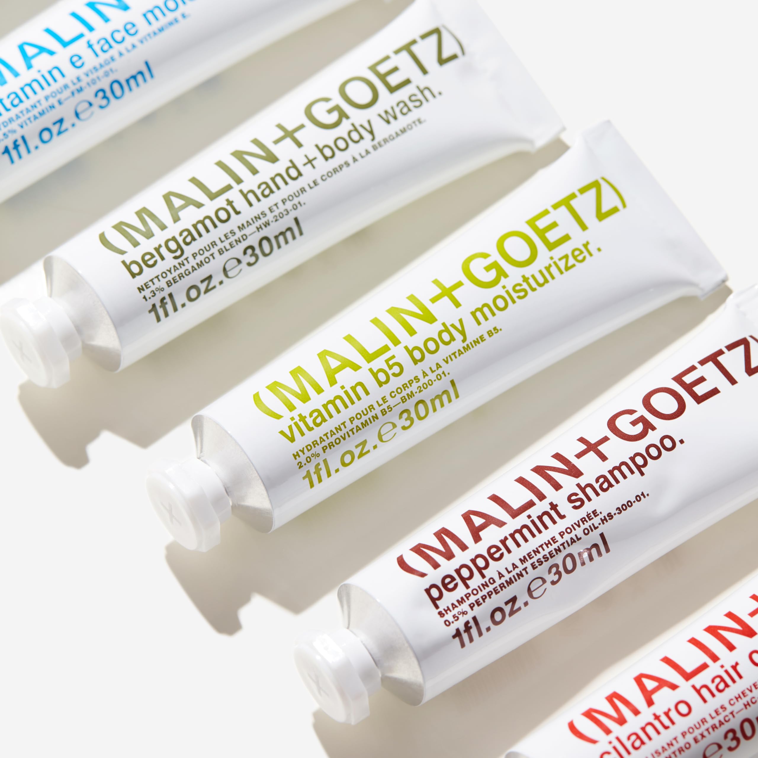 Malin + Goetz Essentials Starter Kit, Set of 6, 1 Fl. Oz. – Face Cleanser, Face Moisturizer, Hand & Body Wash, Body Moisturizer, Hair Shampoo & Conditioner - Travel Size Toiletries