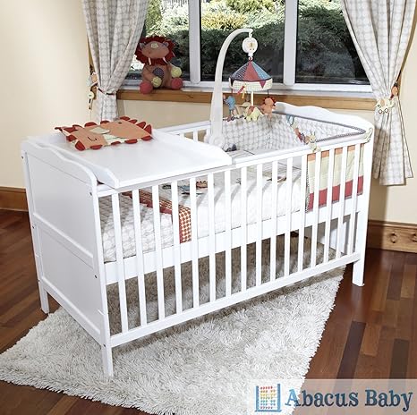 cot bed with drawer and changer on top