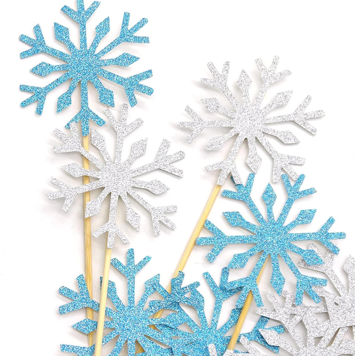 Photo 1 of PartyWoo Frozen Cake Toppers, 20 pcs Snowflakes Cupcake Topper Set, Glitter Silver and Blue for Frozen Cake Winter Wonderland Birthday Party Decorations