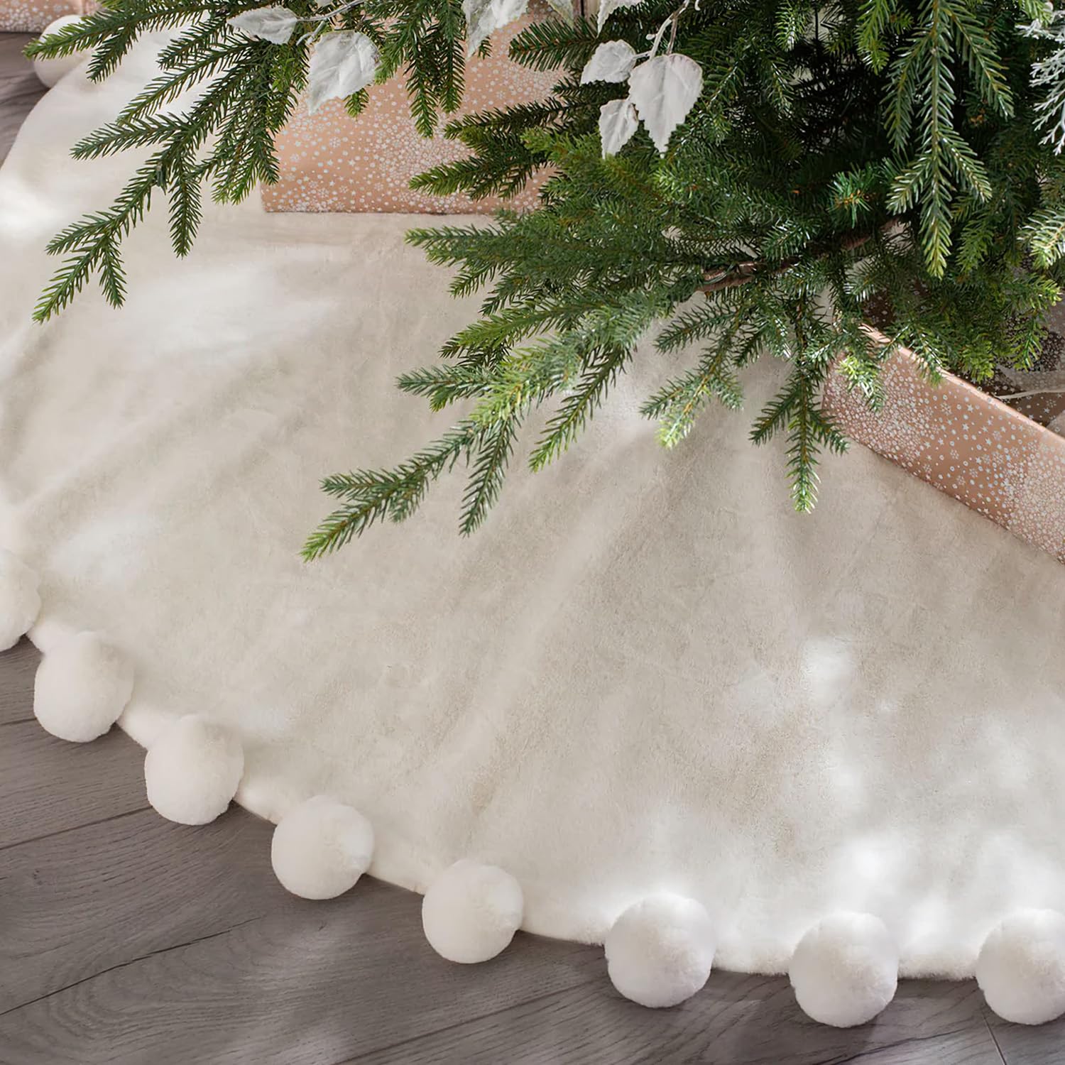 Photo 1 of ORTIGIA Mini Red Christmas Tree Skirt 23 Inch with POM POM Soft Plush Faux Fur Xmas Tree Skirt for Table Top Tree Mini Small Christmas Tree Home Holiday Party Ornaments Indoor Decor Decoration